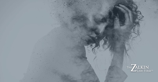 black and white pencil drawing of a woman with her head down, eyes closed and hand on her head.